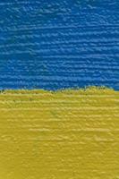 Ukrainian flag painted on wall photo