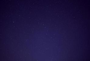 stars in dark blue night sky photo