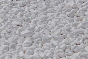 heap of whitewashed stones on Santorini photo