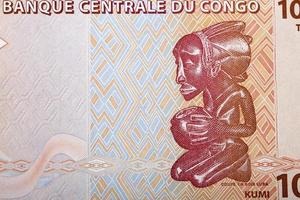 Luba carving from Congolese franc photo