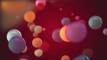 Gently moving multi-colored shiny bokeh bubbles. Loopable full hd motion background. video