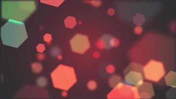 Abstract colorful hexagons bokeh light particles motion background. video