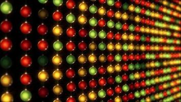 A wall of glowing and flashing colorful Christmas baubles. Loopable, full hd motion background. video