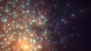 Abstract yellow gold blue energy particles and dots glowing flying sparks festive with bokeh effect and blur background, 4k video, 60 fps video