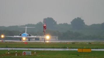 DUSSELDORF, GERMANY JULY 24, 2017 - KLM Cityhopper Fokker 70 PH KZI taxiing after landing at rainy weather. Dusseldorf airport, Germany video