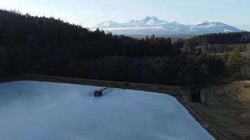 Peaceful mountain scene with calm lake. Scenic view of High Tatras National Park, Slovakia. video