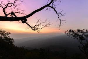 beautiful sky before sunrise at mountain on winter season photo