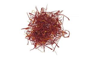 close up of saffron crocus spice isolated on white photo