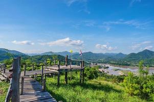 Beautiful landscape view and wooden bridge on Phu Lamduan at loei thailand.Phu Lamduan is a new tourist attraction and viewpoint of mekong river between thailand and loas. photo