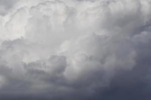 close up of grey fluffy rain cloud photo