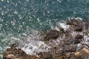 view on sunshine in aqua waves of sea in Antalya photo