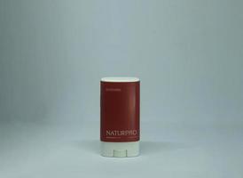 Central Jakarta, Indonesia - March 12th, 2023 - Naturpro easy to use daily deodorant stick with natural ingredients isolated photo on plain white background.
