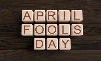 april fools day font text calligraphy block wooden cube oak symbol decoration april joke party festival celebration april fools day comedy carnival 1 st first date fake day harlequin smile.3d render photo