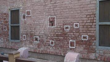 pattern of the bullet mark at jallianwala bagh at amritsar photo