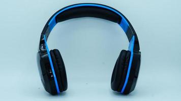 black and Blue headphone images on white background photo