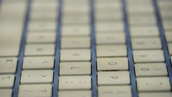 selective focus white apple keyboard photo