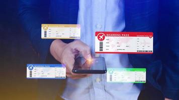 Hand holding boarding pass tickets air travel concept, Choosing checking electronic flight ticket on smartphone. photo