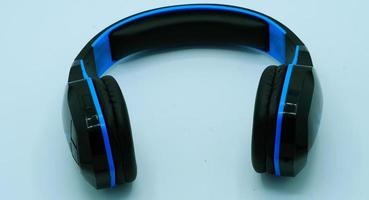 Blue headphone images on white background photo