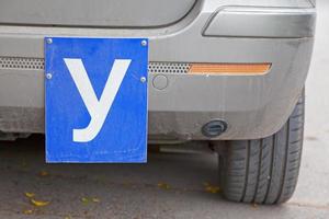 Blue Y driving school sign used in Bulgaria photo