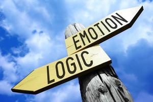 Emotion, Logic - Wooden Signpost with Two Arrows and Sky in Background photo