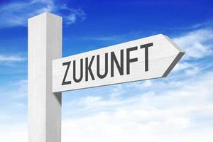 Future in German - White Wooden Signpost with one Arrow photo