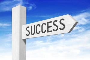 Success - White Wooden Signpost with one Arrow photo