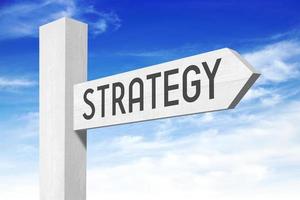 Strategy - White Wooden Signpost with one Arrow photo