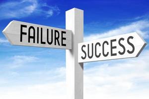 Success, Failure - Wooden Signpost with Two Arrows and Sky in Background