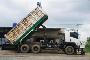 Bogor, Indonesia, 2023 - The process of loading and unloading a truck, photo