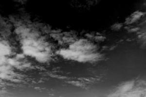 sky with black and white cloud textured background photo