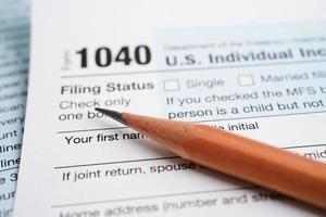 Tax form 1040 U.S. Individual Income Tax Return, business finance concept. photo