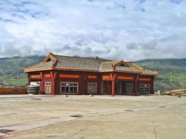a panorama with a historical Tibetan temple photo