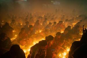 Narayanganj, Dhaka, Bangladesh, on November 12, 2022, Devotees offering prayers at the Shri Shri Lokanath Brahmachari Ashram temple during the Hindu religious fasting festival of Rakher Upobash. photo