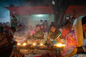Narayanganj, Dhaka, Bangladesh, on November 12, 2022, Devotees offering prayers at the Shri Shri Lokanath Brahmachari Ashram temple during the Hindu religious fasting festival of Rakher Upobash. photo