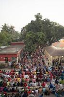 Narayanganj, Dhaka, Bangladesh, on November 12, 2022, Devotees offering prayers at the Shri Shri Lokanath Brahmachari Ashram temple during the Hindu religious fasting festival of Rakher Upobash. photo