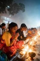 Narayanganj, Dhaka, Bangladesh, on November 12, 2022, Devotees offering prayers at the Shri Shri Lokanath Brahmachari Ashram temple during the Hindu religious fasting festival of Rakher Upobash. photo