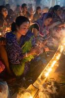 Narayanganj, Dhaka, Bangladesh, on November 12, 2022, Devotees offering prayers at the Shri Shri Lokanath Brahmachari Ashram temple during the Hindu religious fasting festival of Rakher Upobash. photo