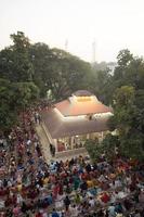 Narayanganj, Dhaka, Bangladesh, on November 12, 2022, Devotees offering prayers at the Shri Shri Lokanath Brahmachari Ashram temple during the Hindu religious fasting festival of Rakher Upobash. photo