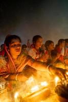 Narayanganj, Dhaka, Bangladesh, on November 12, 2022, Devotees offering prayers at the Shri Shri Lokanath Brahmachari Ashram temple during the Hindu religious fasting festival of Rakher Upobash. photo