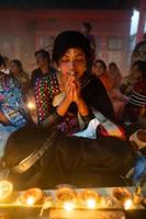 Narayanganj, Dhaka, Bangladesh, on November 12, 2022, Devotees offering prayers at the Shri Shri Lokanath Brahmachari Ashram temple during the Hindu religious fasting festival of Rakher Upobash. photo