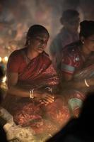 Narayanganj, Dhaka, Bangladesh, on November 12, 2022, Devotees offering prayers at the Shri Shri Lokanath Brahmachari Ashram temple during the Hindu religious fasting festival of Rakher Upobash. photo