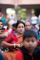 Narayanganj, Dhaka, Bangladesh, on November 12, 2022, Devotees offering prayers at the Shri Shri Lokanath Brahmachari Ashram temple during the Hindu religious fasting festival of Rakher Upobash. photo