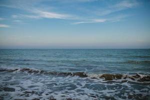 perfect sky and water of ocean photo