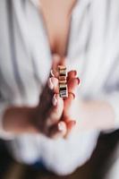 Wedding Rings Between Fingers. photo