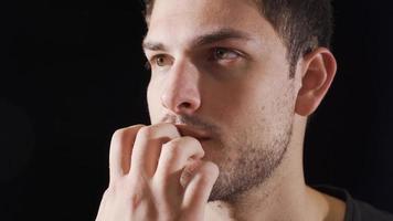 Nail biting in close-up. The man is biting his nails. video