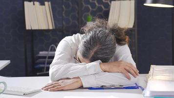 Lazy and undisciplined office worker napping at the desk. Lazy and undisciplined businessman sleeping in office and not working about jobs. video