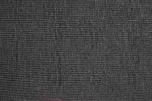 Black knitted fabric texture. Abstract modern Knit texture black color. Dark knitted background photo