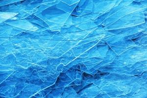 Ice surface of the river. Texture of ice shards. Winter background. photo