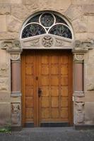 wooden door with classif frame photo