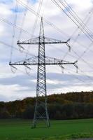 Power Grid Pylon at autun forest photo